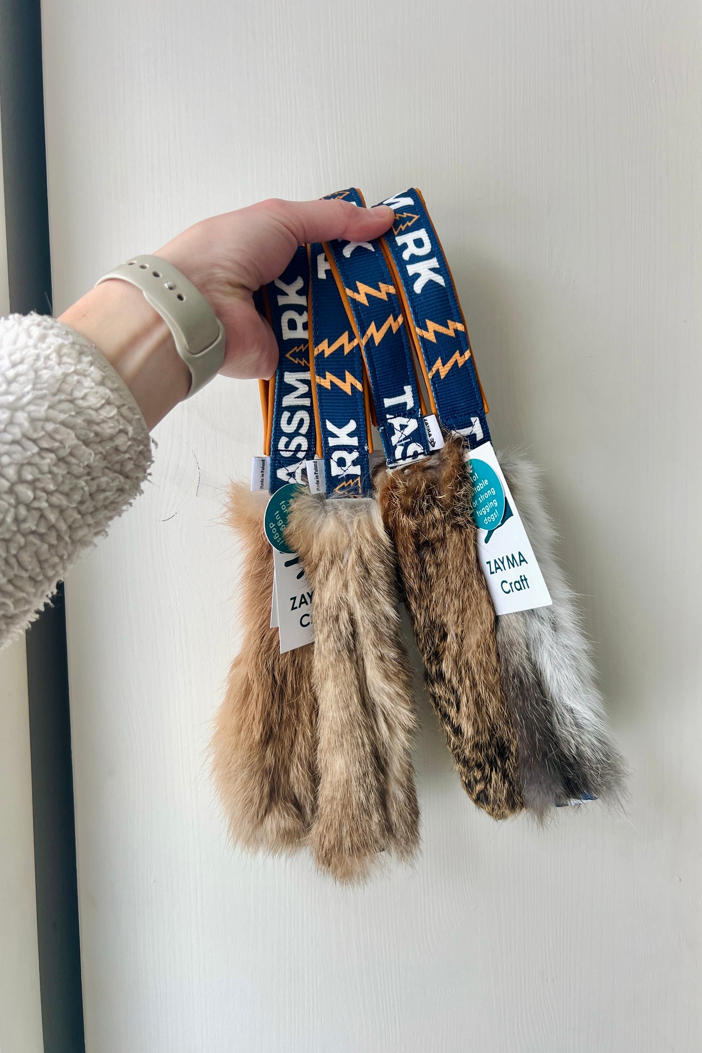 Rabbit fur pocket tug with handle