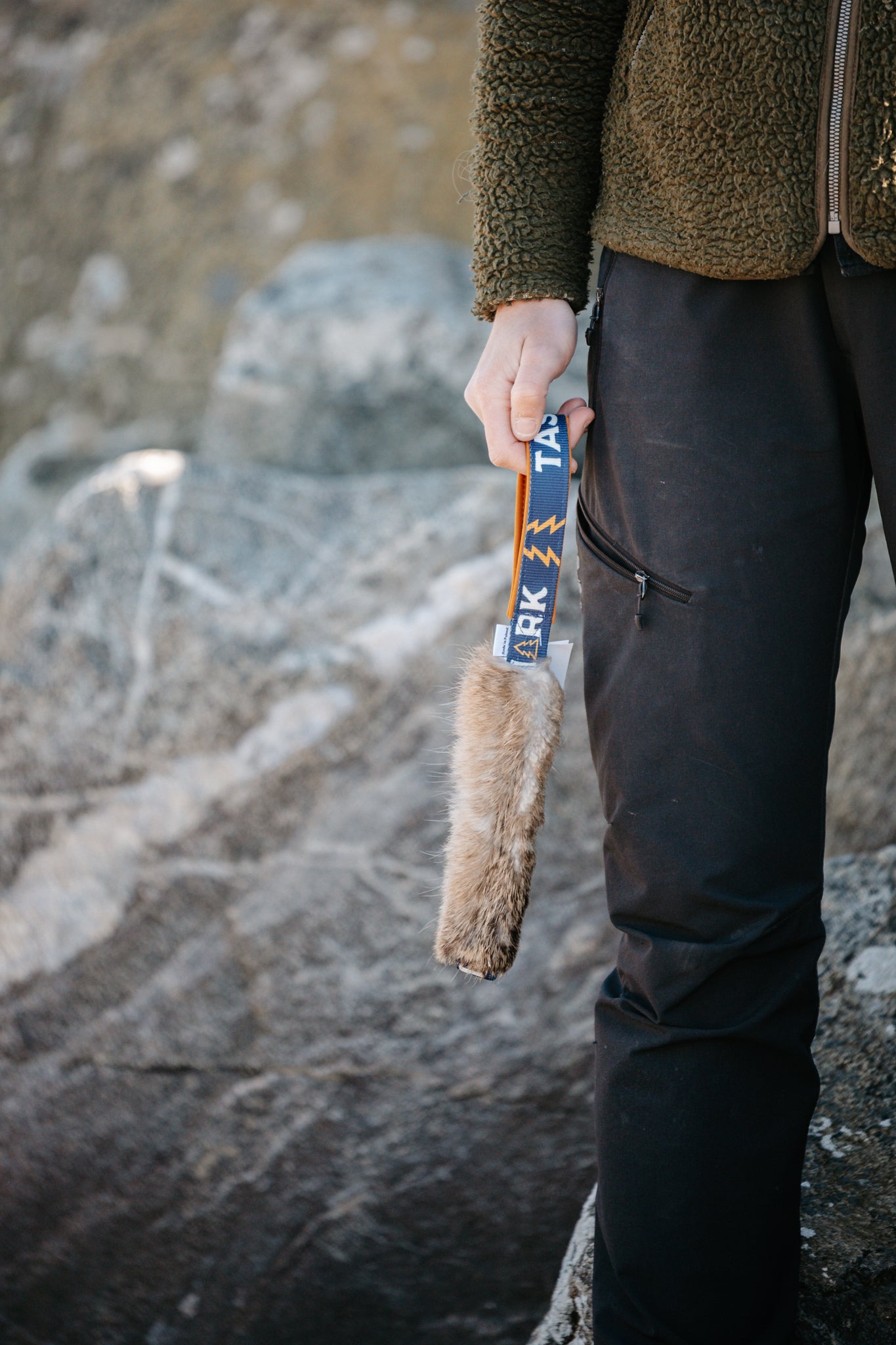 Rabbit fur pocket tug with handle
